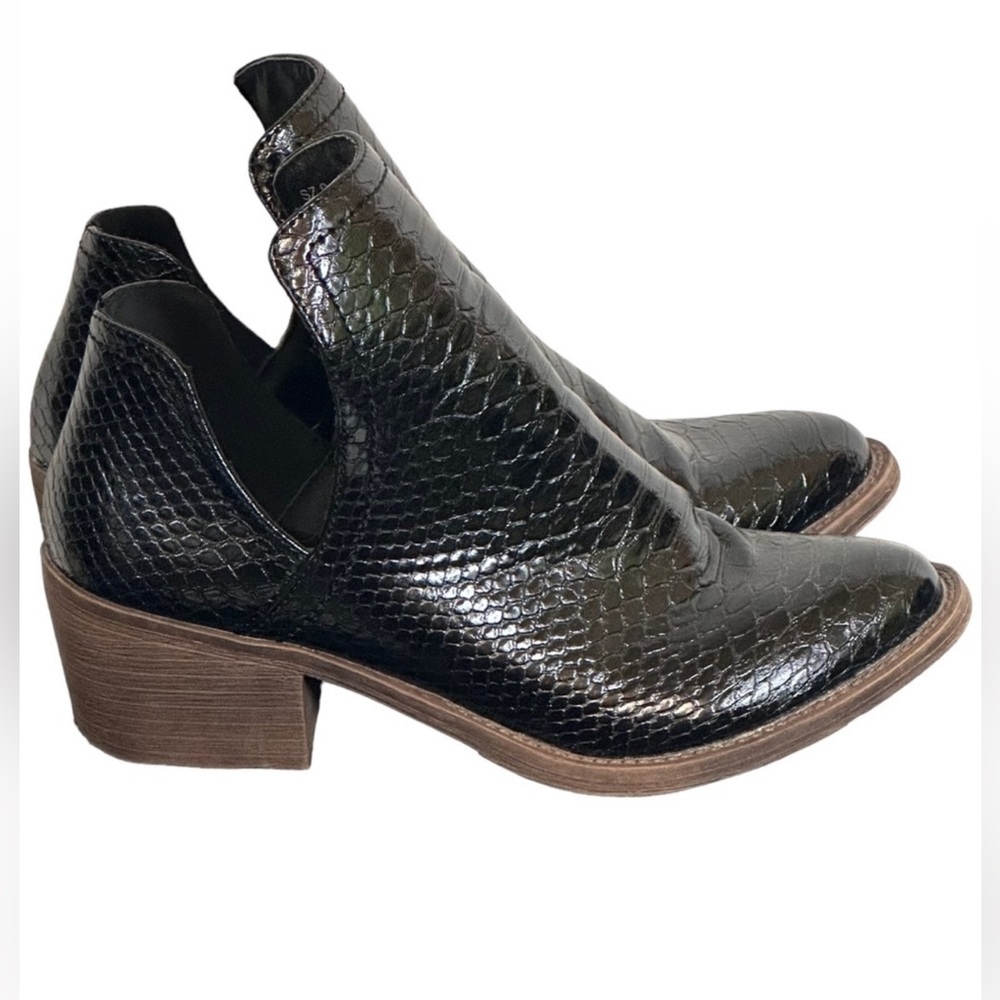 Volatile black booties